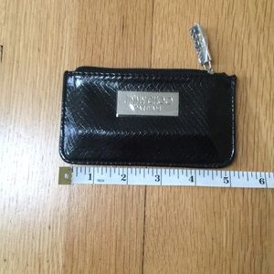 Tiny Jimmy Choo black pouch
